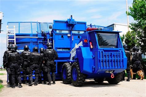 Skid steer modified into riot control vehicle 